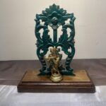 Teak wood table top decor with brass idol